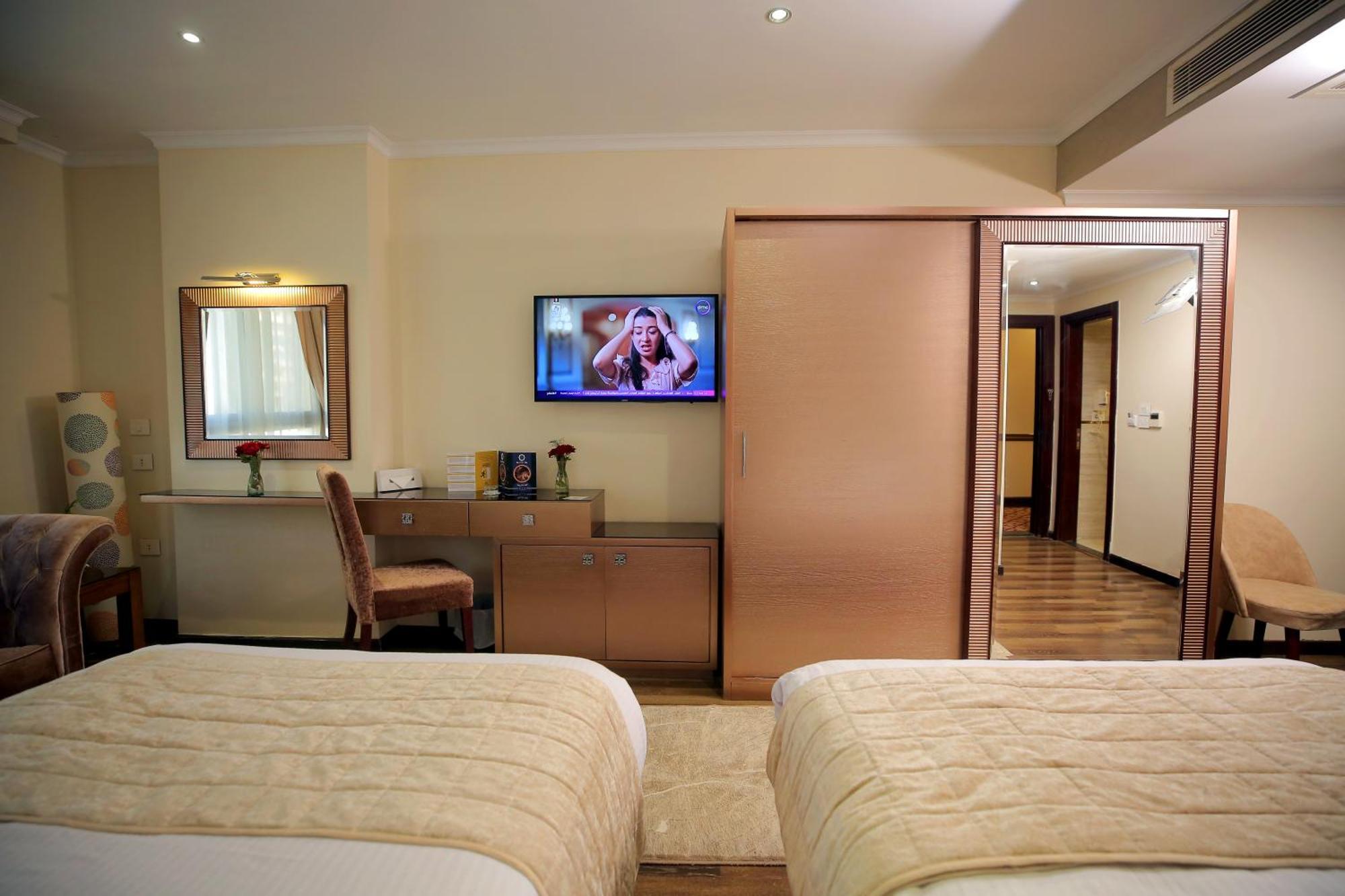 Cairo Taj Hotels & Suites - Dokki Esterno foto