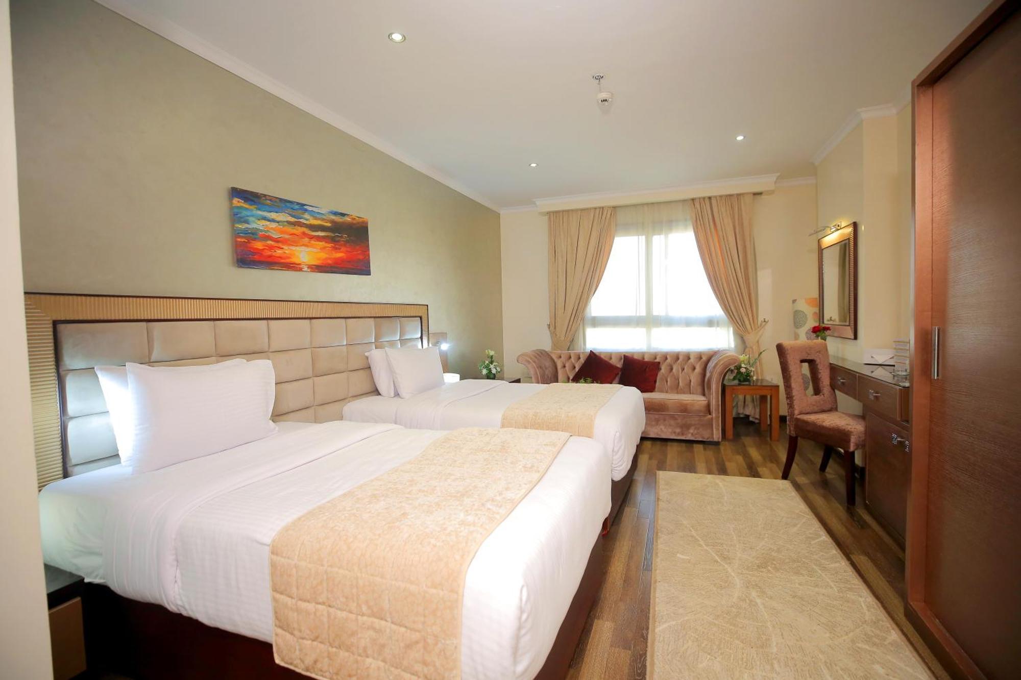 Cairo Taj Hotels & Suites - Dokki Esterno foto