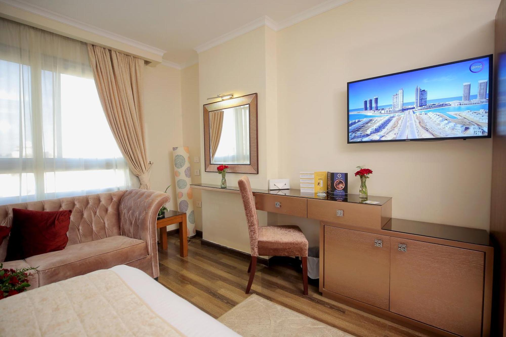 Cairo Taj Hotels & Suites - Dokki Esterno foto