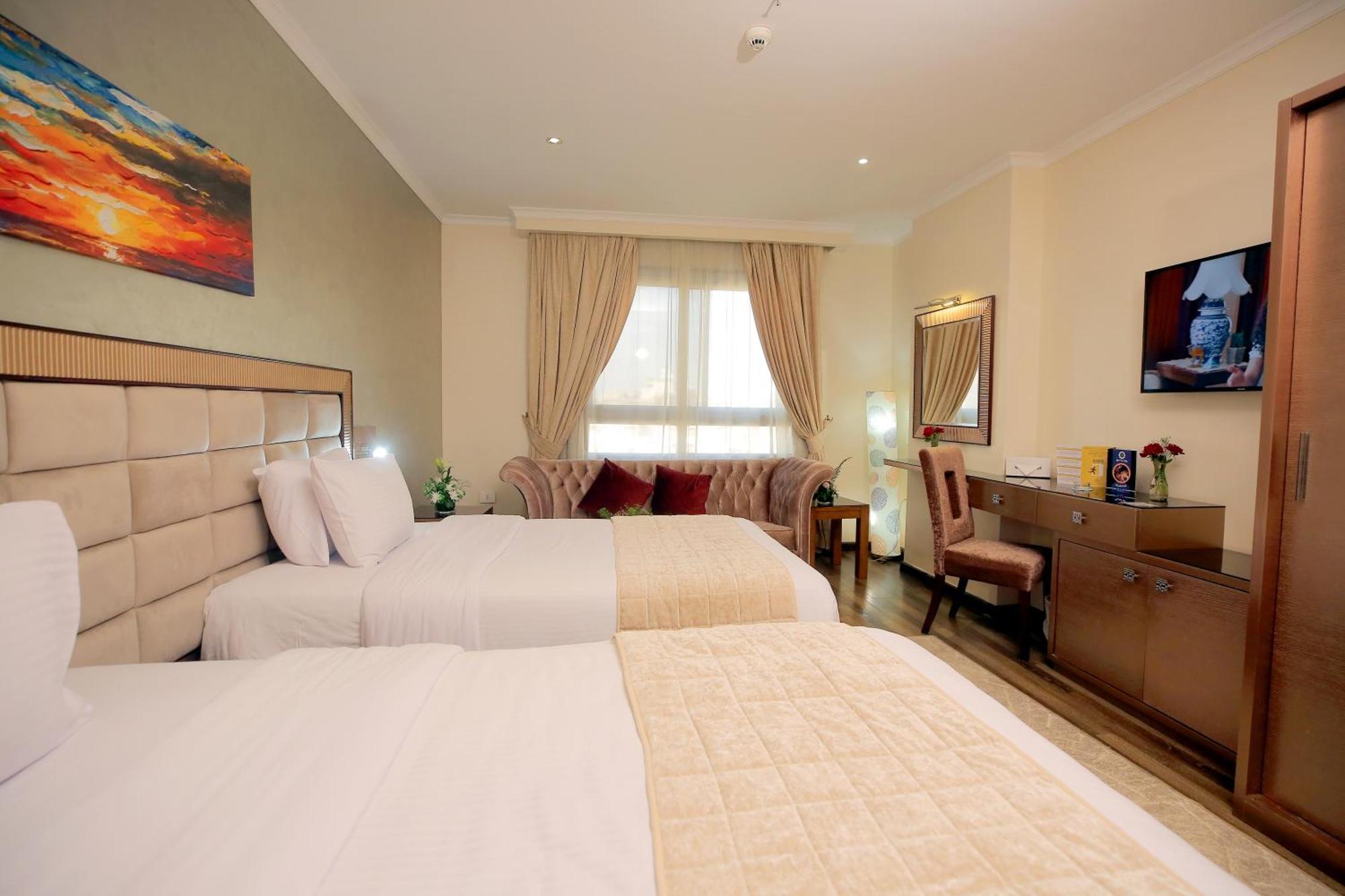 Cairo Taj Hotels & Suites - Dokki Esterno foto
