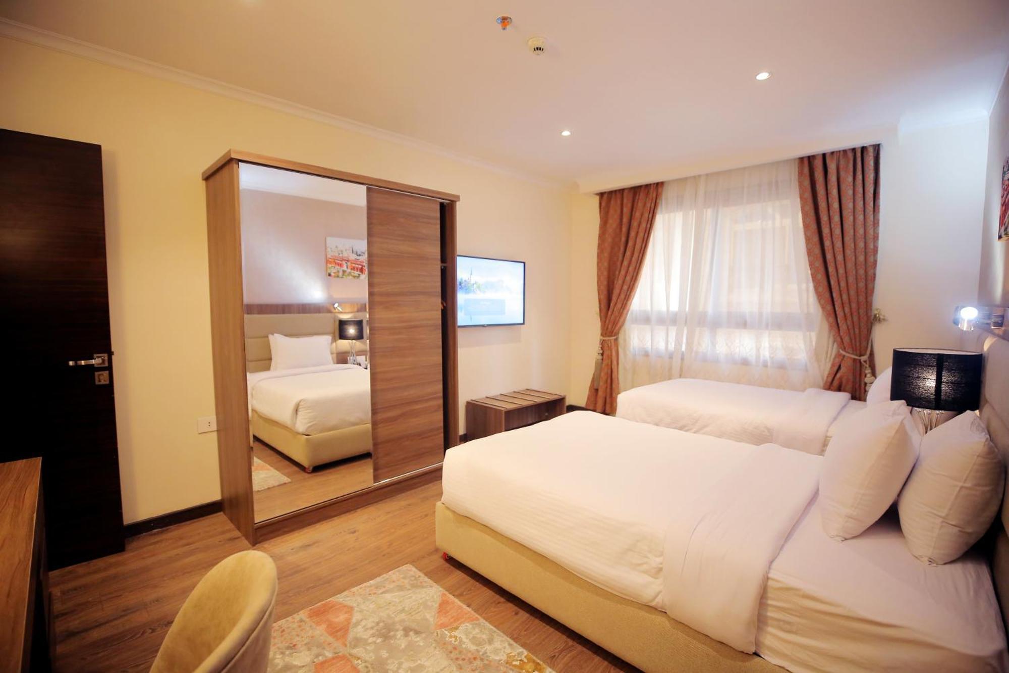 Cairo Taj Hotels & Suites - Dokki Esterno foto