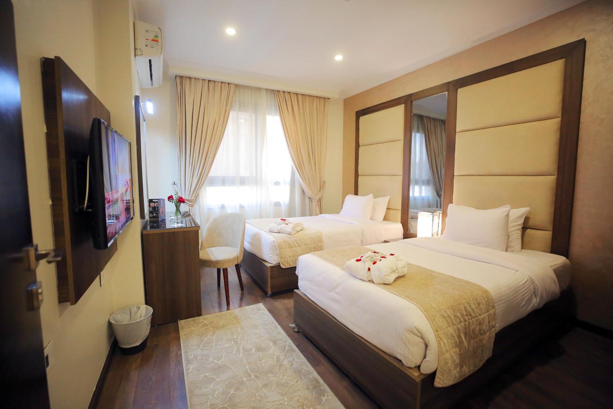 Cairo Taj Hotels & Suites - Dokki Esterno foto