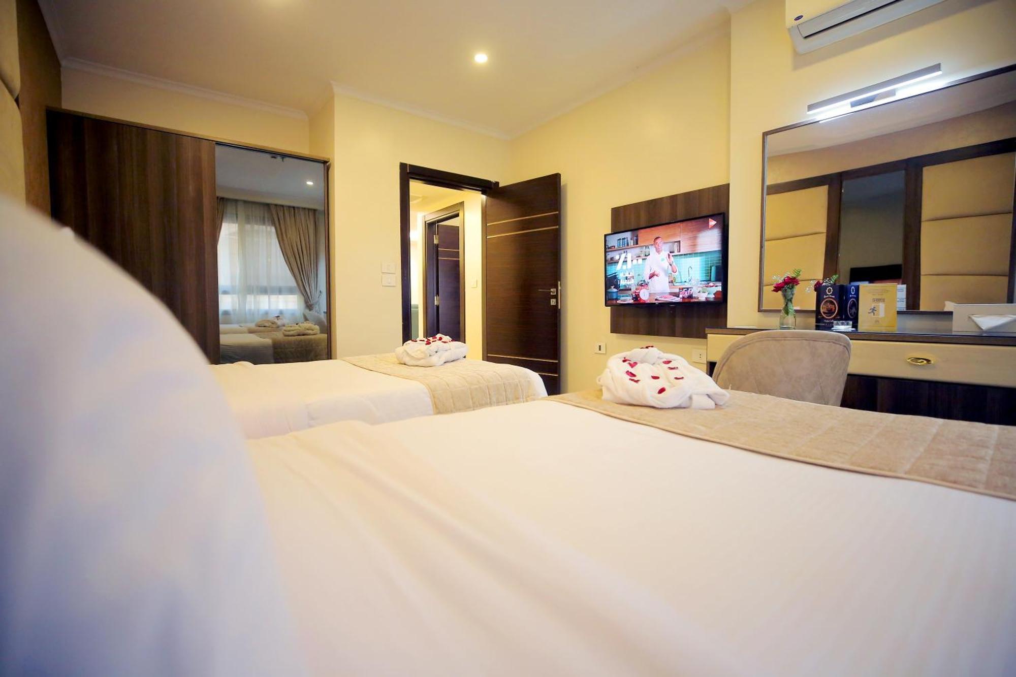 Cairo Taj Hotels & Suites - Dokki Esterno foto
