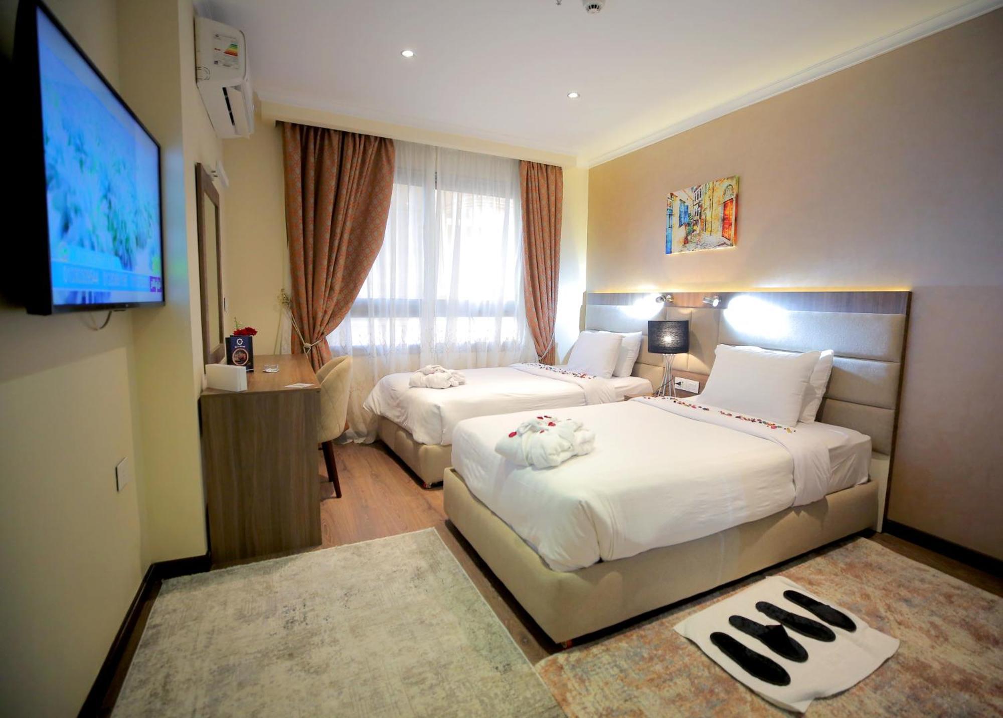 Cairo Taj Hotels & Suites - Dokki Esterno foto