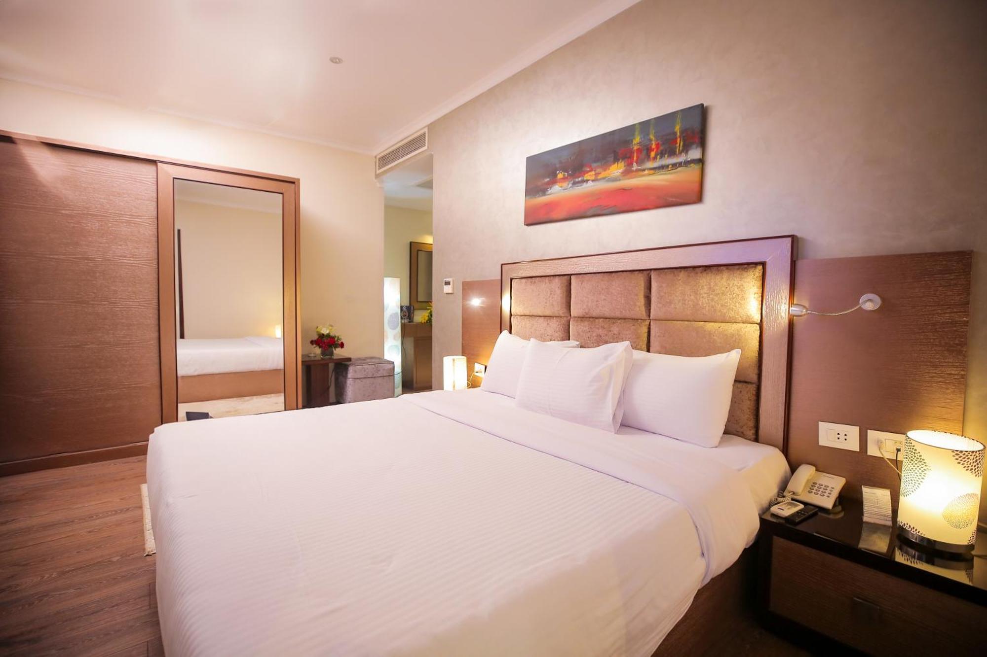 Cairo Taj Hotels & Suites - Dokki Esterno foto