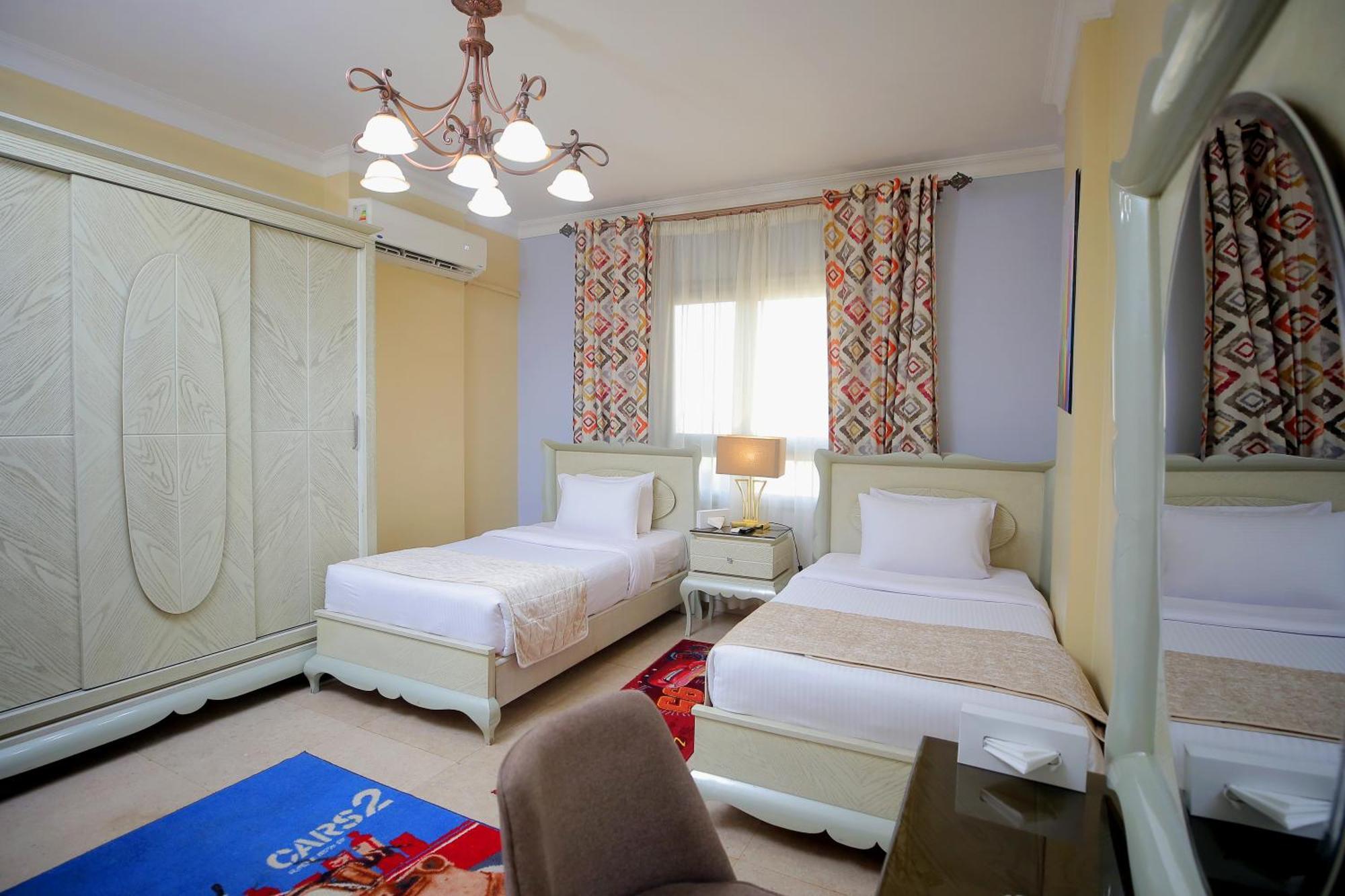 Cairo Taj Hotels & Suites - Dokki Esterno foto